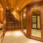 A wine cellar with many bottles of wine.