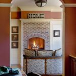 A living room with a fireplace and a couch