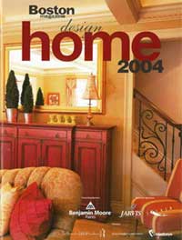 A home magazine cover with a red couch and stairs.